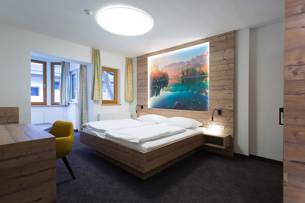 Schlafzimmer "Ahorn" - Ferienwohnung Aparthotel Tyrol